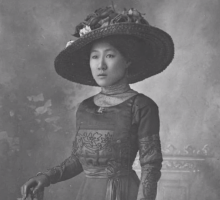 Chinese women wearing a large brimmed hat