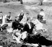 A family having a picnic, with lots of smiles in 1924
